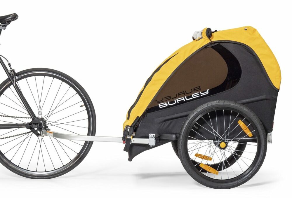 Burley Bee Trailer attached to a bike Cycle Sprog