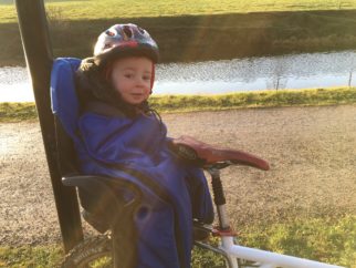 Keeping warm in a rear bike seat with the Huby Muffle