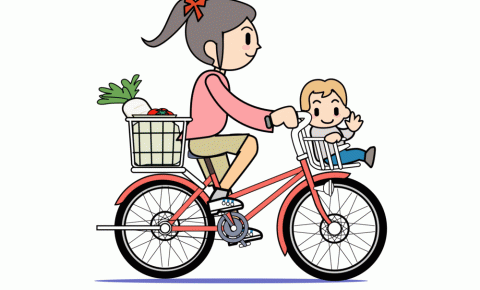 Child_riding_in_front_bike_seat