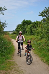 hiring bikes for the family - riding with mum