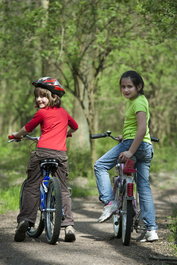 kids learning to ride a bike