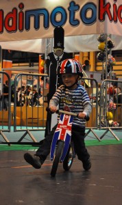 Birmingham NEC Cycle Show - child riding the Kiddimoto Kurve Union Jack Balance Bike review test ride