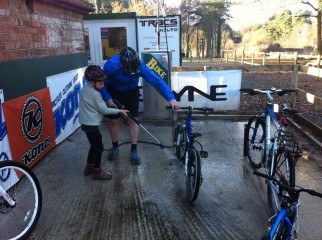 Delamere family cycling - cleaning the bikes