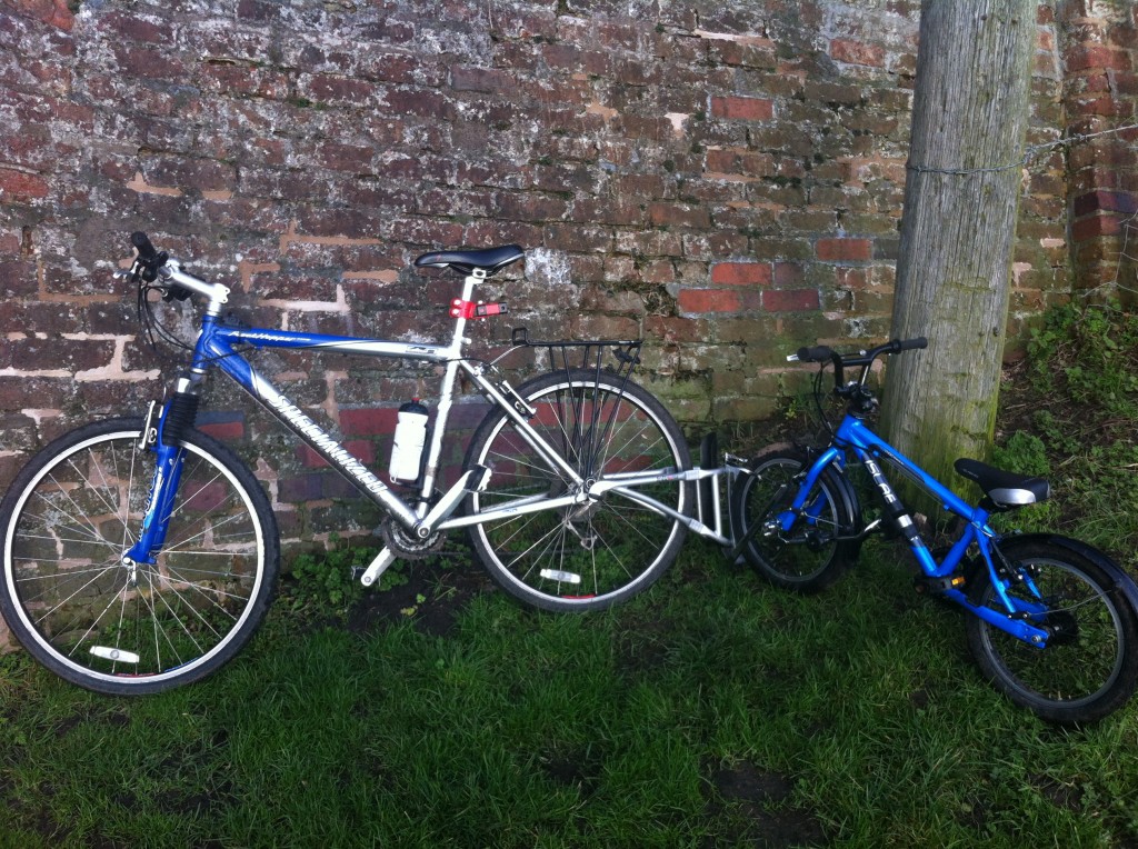 Adult Bike pulling a childs bike Cycle Sprog