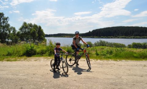 Family bike ride at Alwen Reservoir