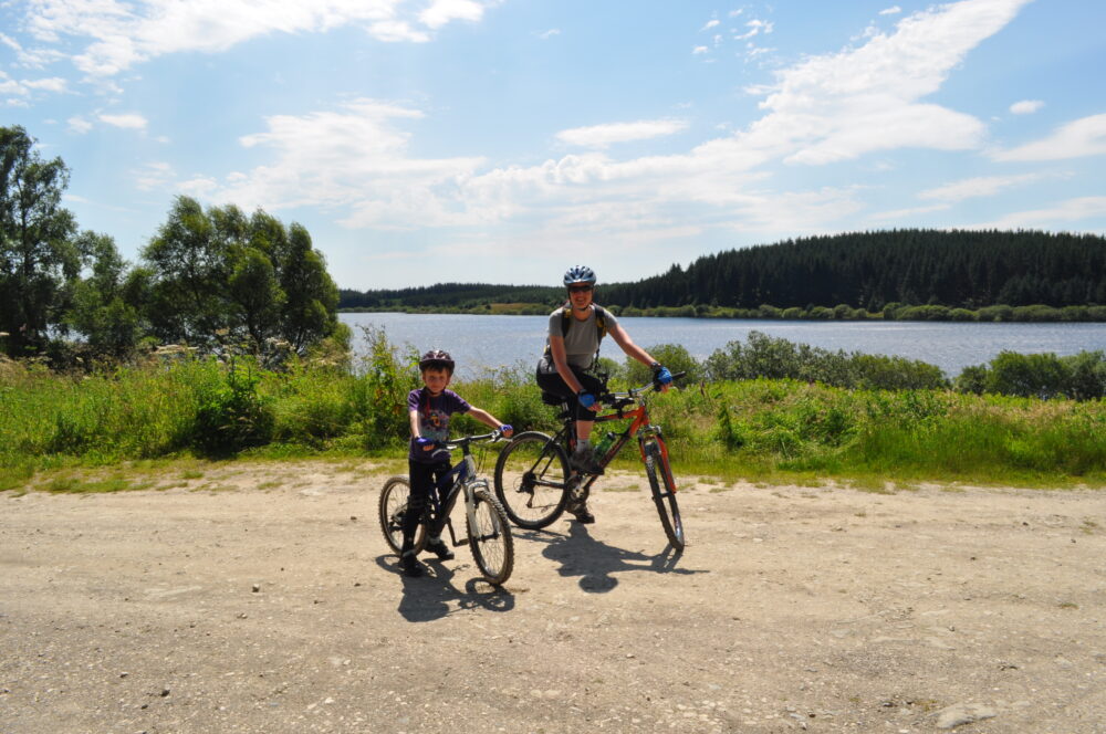 Family bike ride at Alwen Reservoir