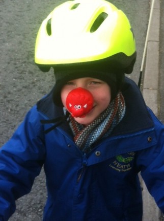 Cyclilng to school on Red Nose Day Comic Relief