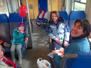On Dutch trains with children's bikes, adult bikes and trailers during our family cycling holiday to Holland