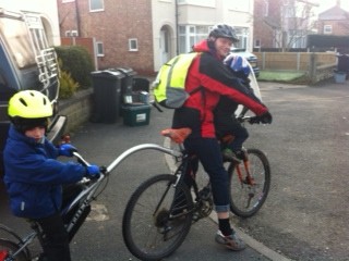 Tagalong and front bike seat on the cycle ride to school each day