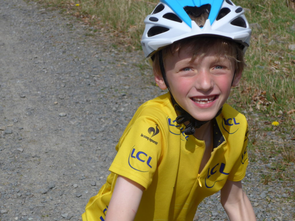 Team Sky kids cycling helmet and yellow jersey