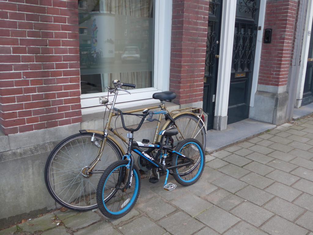 Photo of adult and kids bike in Amsterdam, Holland 2016