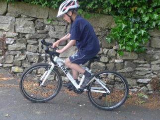Our 7 year old reviewer of the Frog 58 kids road race bike