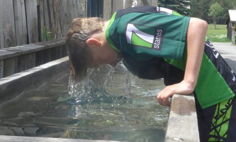 Cooling off after a family bike ride on a hot day