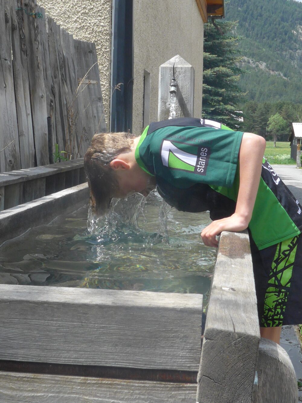 Cooling off after a family bike ride on a hot day