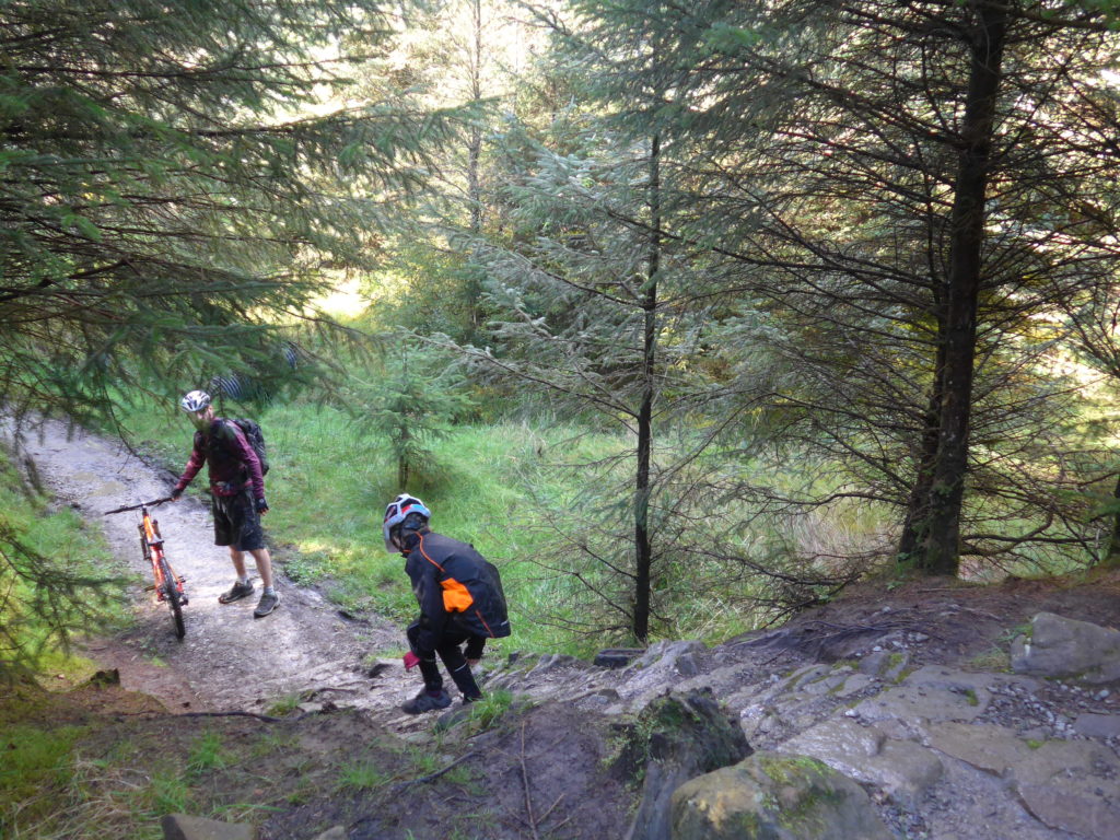 climbing-down-damp-rock