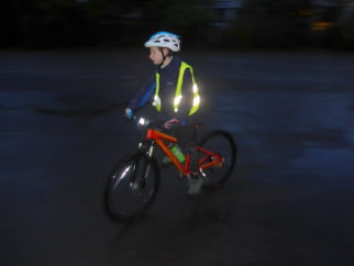 Cycling in the dark - using a hi-vis vest will help make your child visible to drivers in the dark