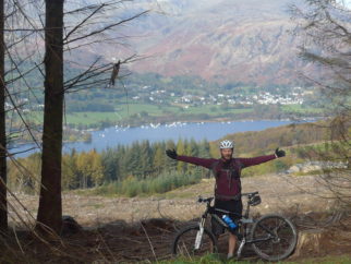 Mountain biking during the autumn at Grizedale Forest, Cumbria