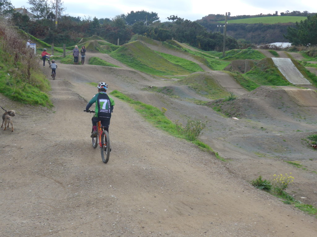 Riding the balance bike course at The Track, Cornwall