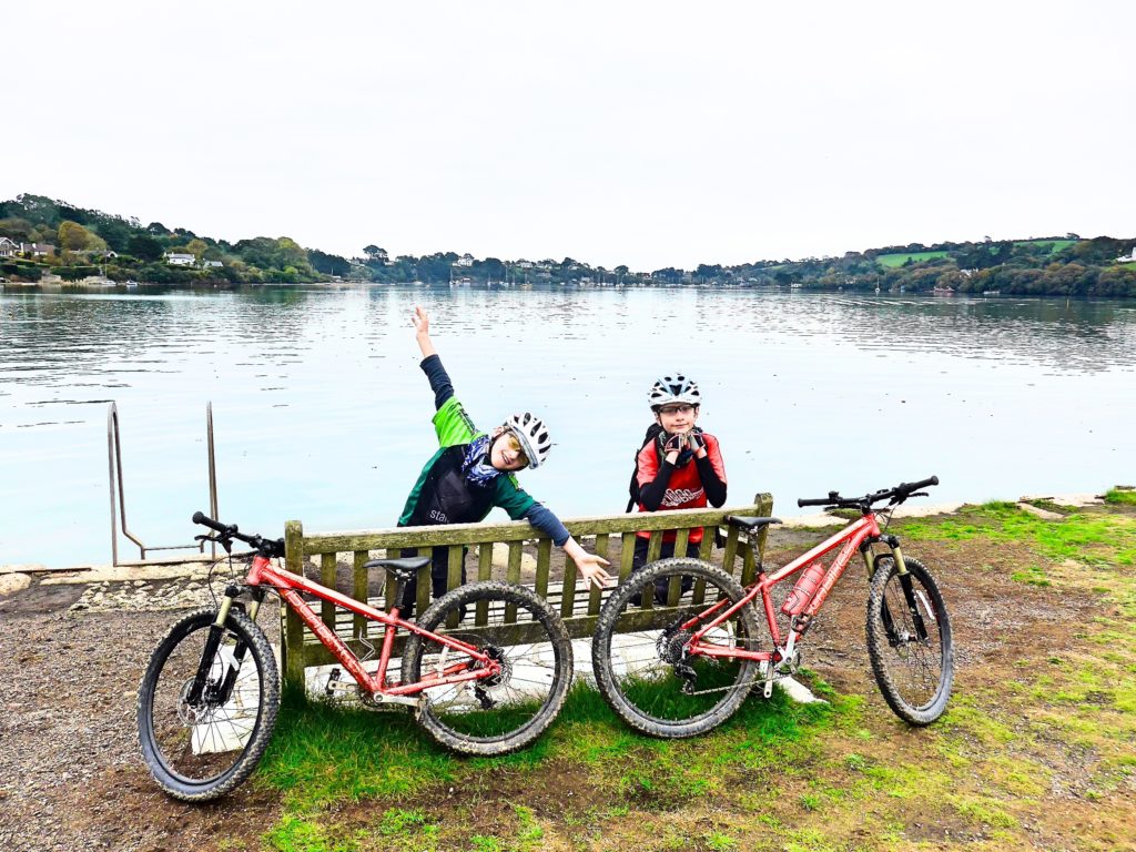 Cornwall coast to coast with kids- beautiful Devoran Point with boys and bikes in foreground