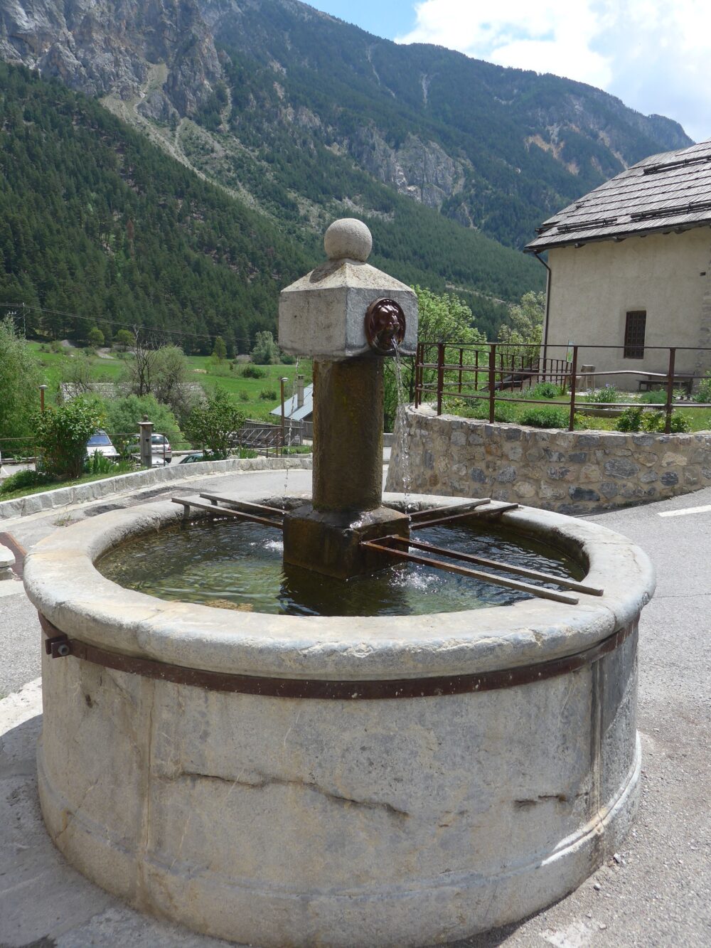 Fountains are a great place to fill your water bottle when family cycling in France