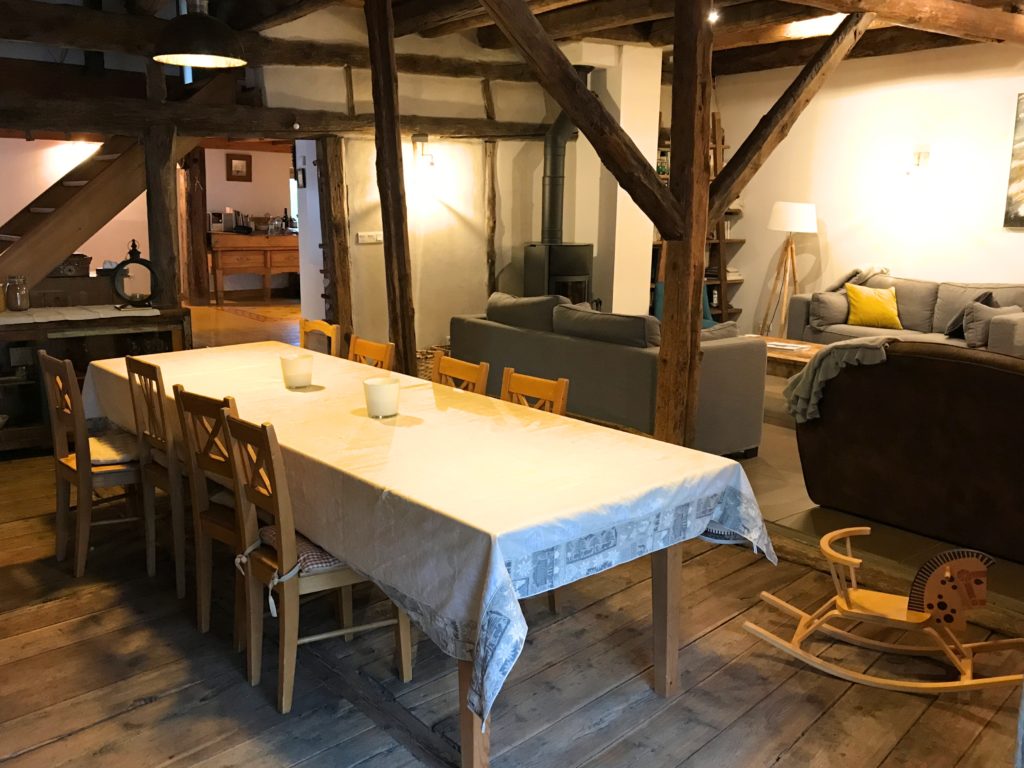The lounge and dining area at family friendly chalet Maison Amalka in the French Alps close to Montgenèvre, Briançon and Col du Lautaret, France