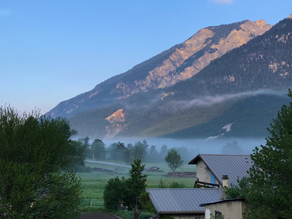 Cycling with kids in the french alps - early morning view