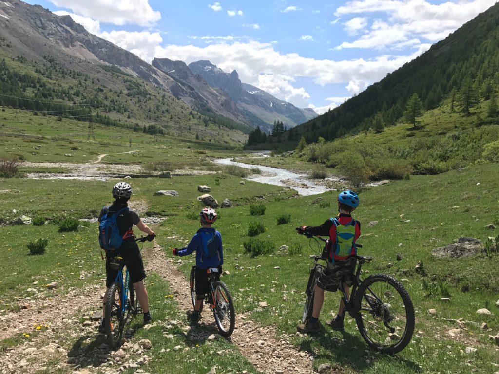 Family cycling at Col du Lautaret, French Alps during the May half term