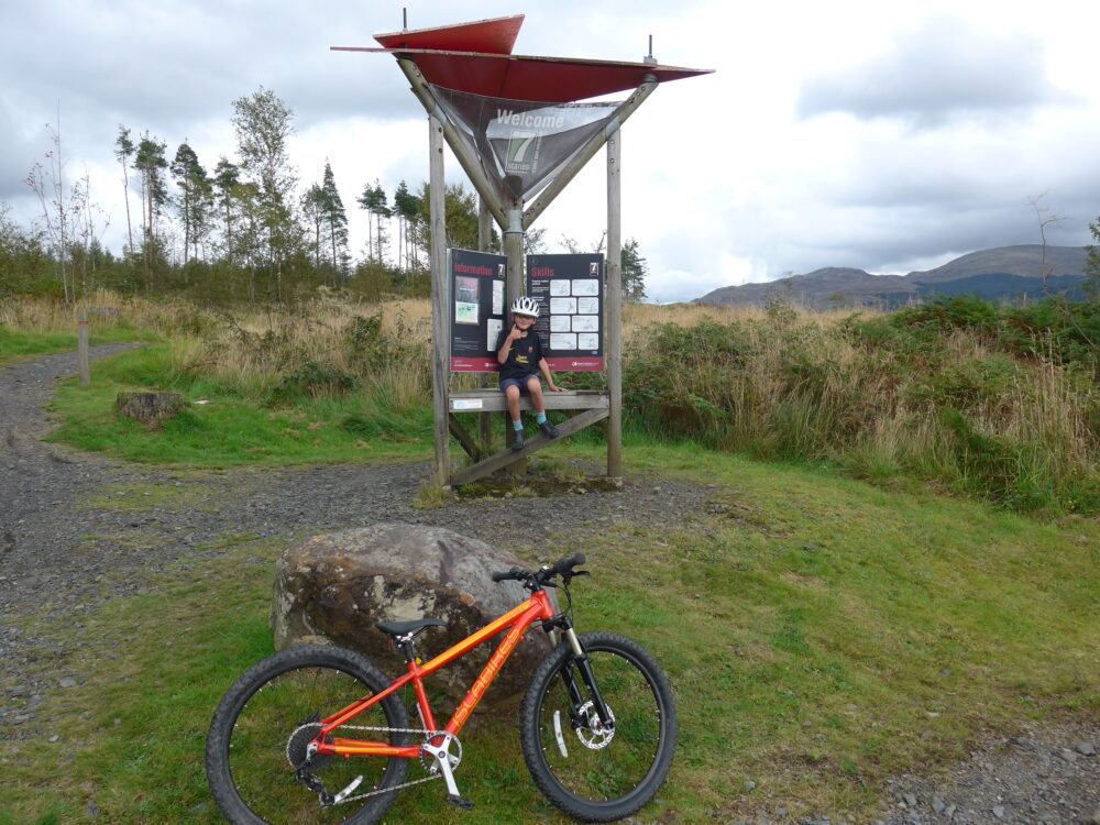 Family mountain biking on the Islabikes Creig 24 at Glentrool, Scotland