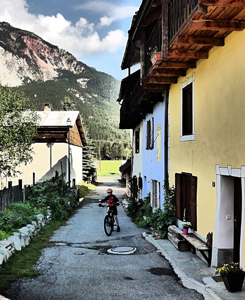 Cycling with kids in the french alps - ready for biking outside Maison Amalka