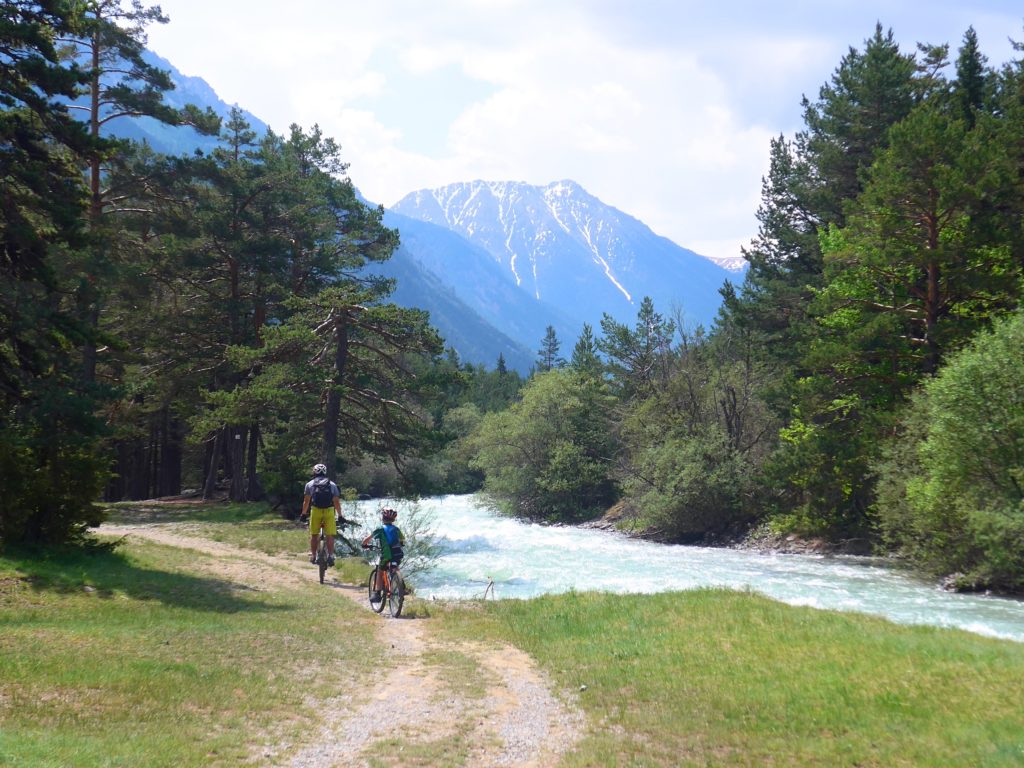 Family cycling along the Vallée de la Clarée in the Southern French Alps - the kids rode their bikes brilliantly along the course of the Clarée river 