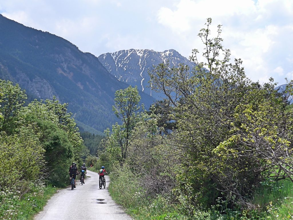 Family cycling in the Vallée de la Clarée in the French Alps -the views are perfect!