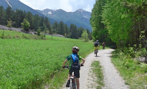 Family cycling in the Vallée de la Clarée, French Alps