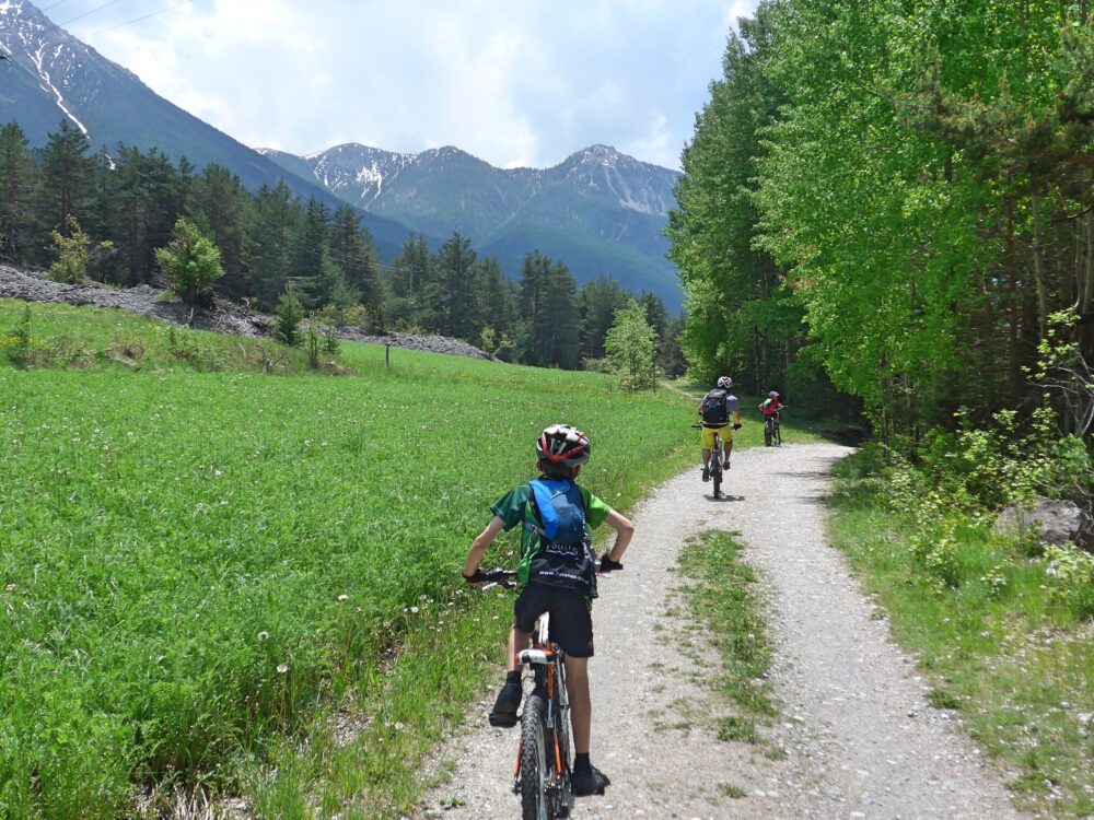 Family cycling in the Vallée de la Clarée, French Alps