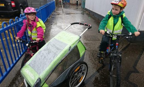 Kids riding their bikes to school