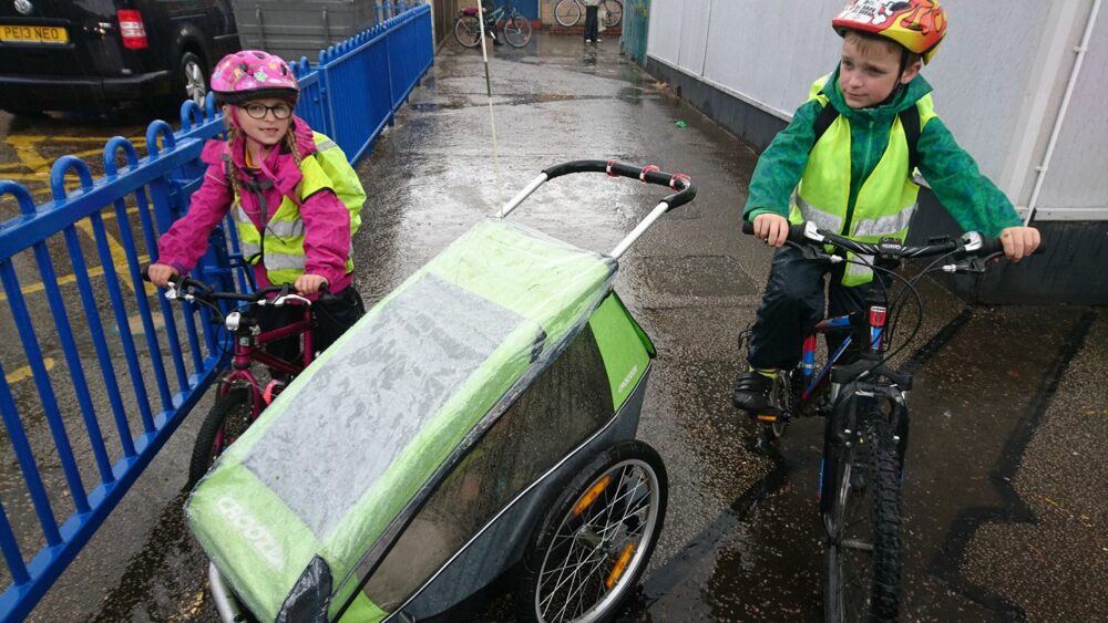 Kids riding their bikes to school