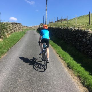 Polaris Mini cycling top in action as a road jersey