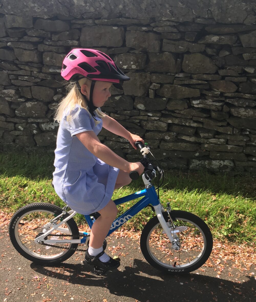 Jessica riding Woom 3 woom 3 child riding bike