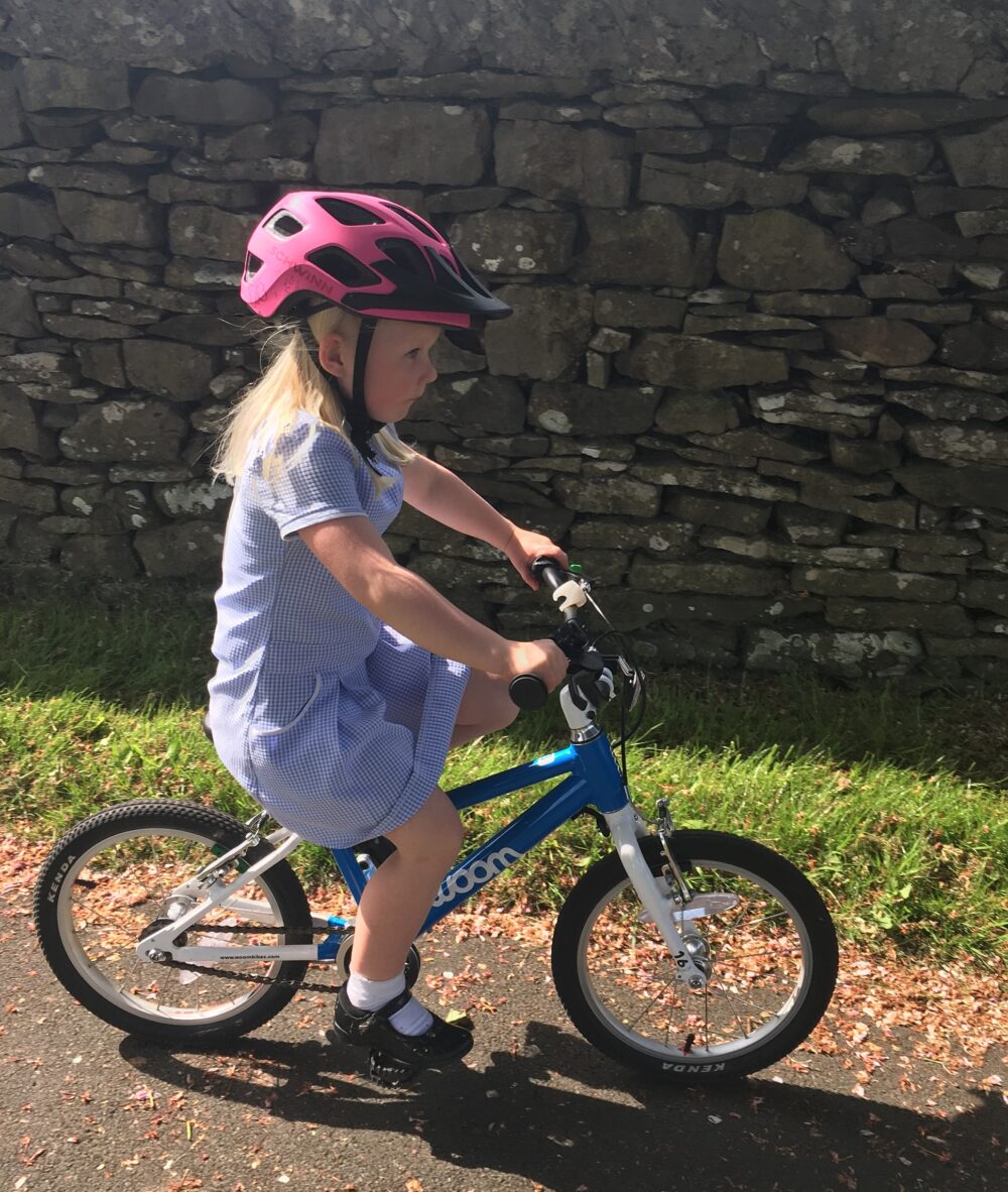 woom 3 child riding bike