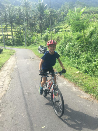 Tom, aged 9, cycling in Bali