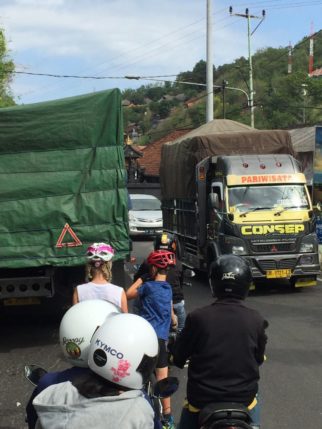 Cycling in the traffic on Bali