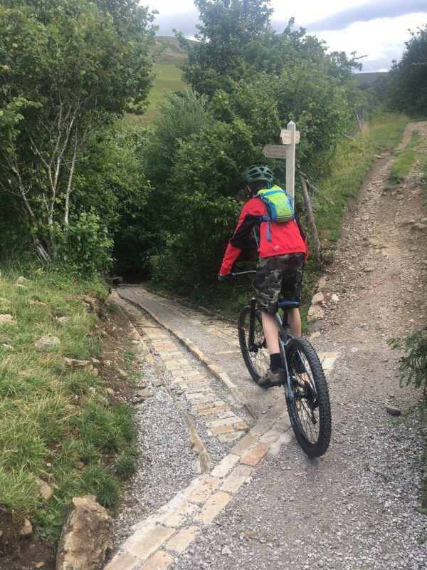 Steep descent out of Keld on the Swale Trail Yorkshire Dales