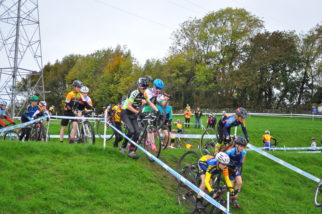 Carrying bikes downhill on the U14's Cyclcocross race