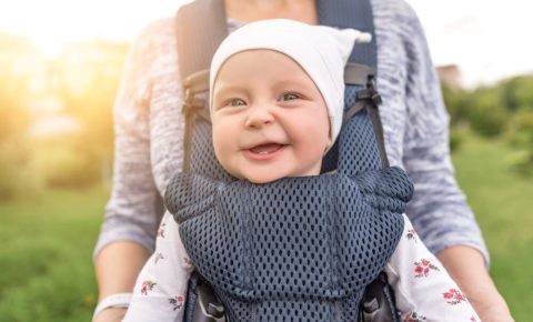 Is it safe to cycle with my baby in a sling or papoose?