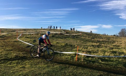 Riding in a junior British Cycling cyclocross U14's kids cycle race (CX)