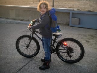 Girl on a bike - having fun on bikes is part of childhood