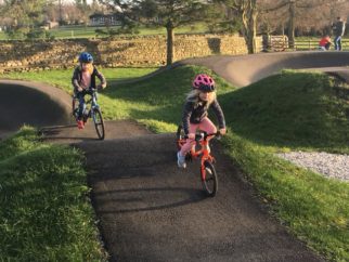 Girls on bicycles - at the pump track