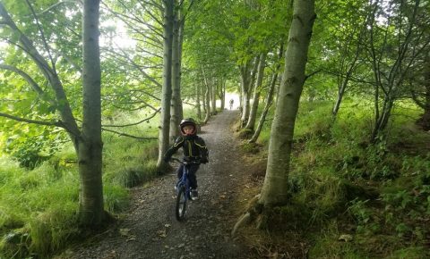 Family cycling on the Mary Peters trails in Ireland