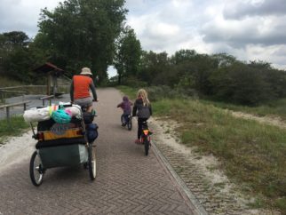 family cycling holiday to The Netherlands - trailer and two children riding bikes