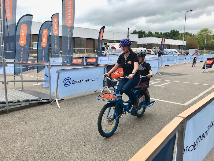 family cargo bikes at the 2019 Cycle Show - Pedego Stretch in action