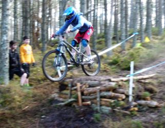 Jessica taking the drop - girl mountain biker